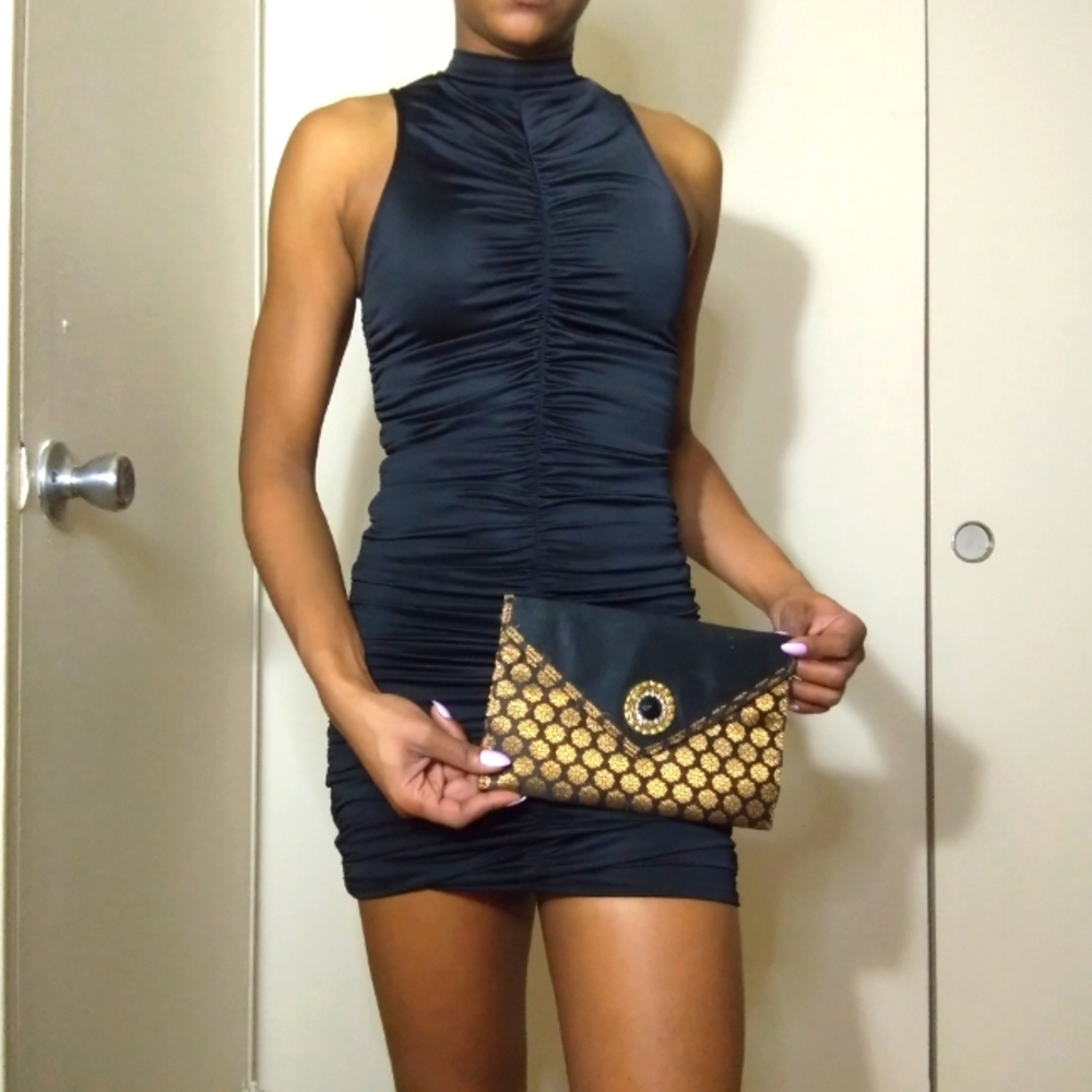 Women's black and bronze clutch